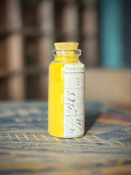 Apothecary bottle filled with yellow pigment PJ29