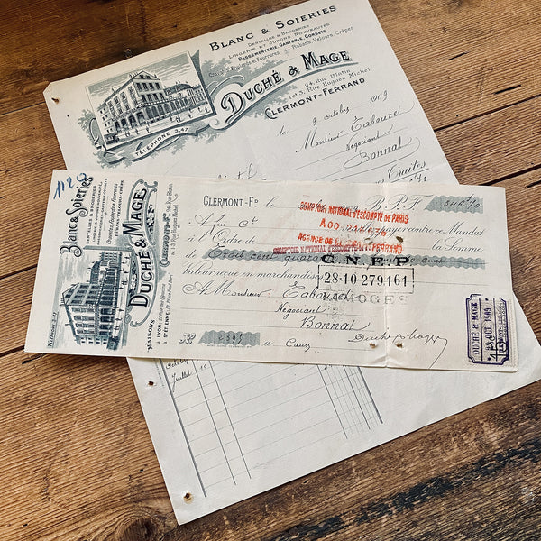 Duché & Mage letterhead and check